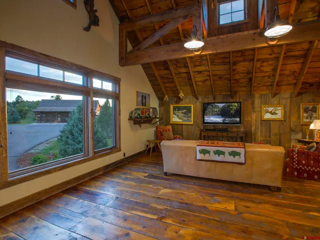 a view of a big house with a street