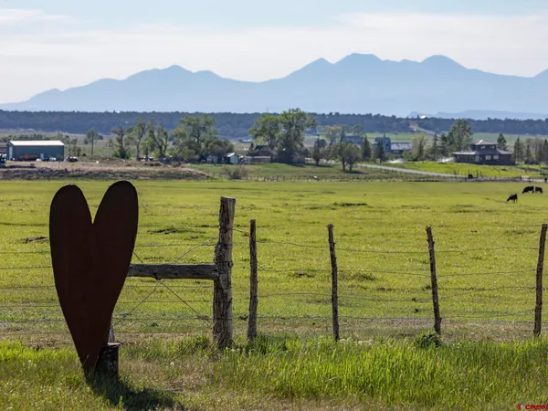 a view of an ocean and a mountain