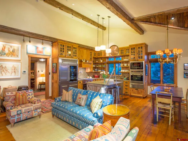 a view of a chairs and table in a patio