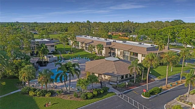 an aerial view of a house with a garden
