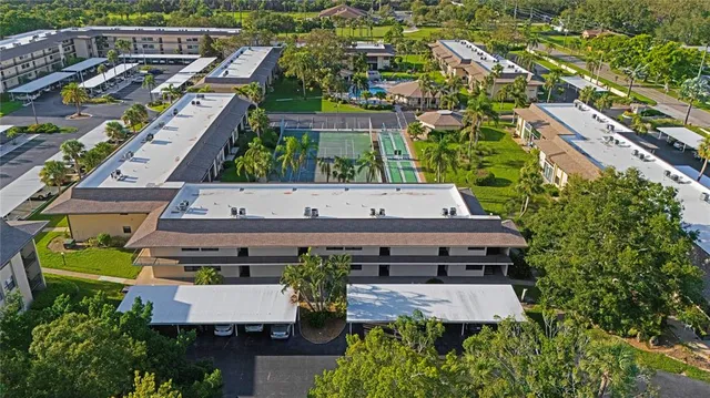 an aerial view of a house with a garden