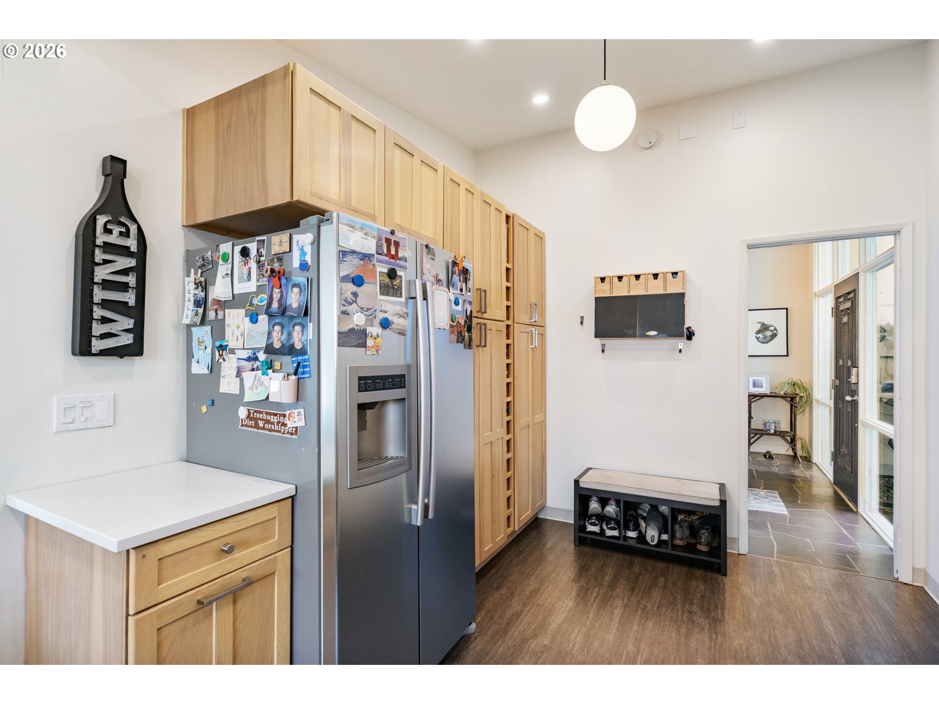 13410 Northwest Overton Street Portland, OR 97229 - Photo 19 of 48 a kitchen with stainless steel appliances a stove cabinets and wooden floor