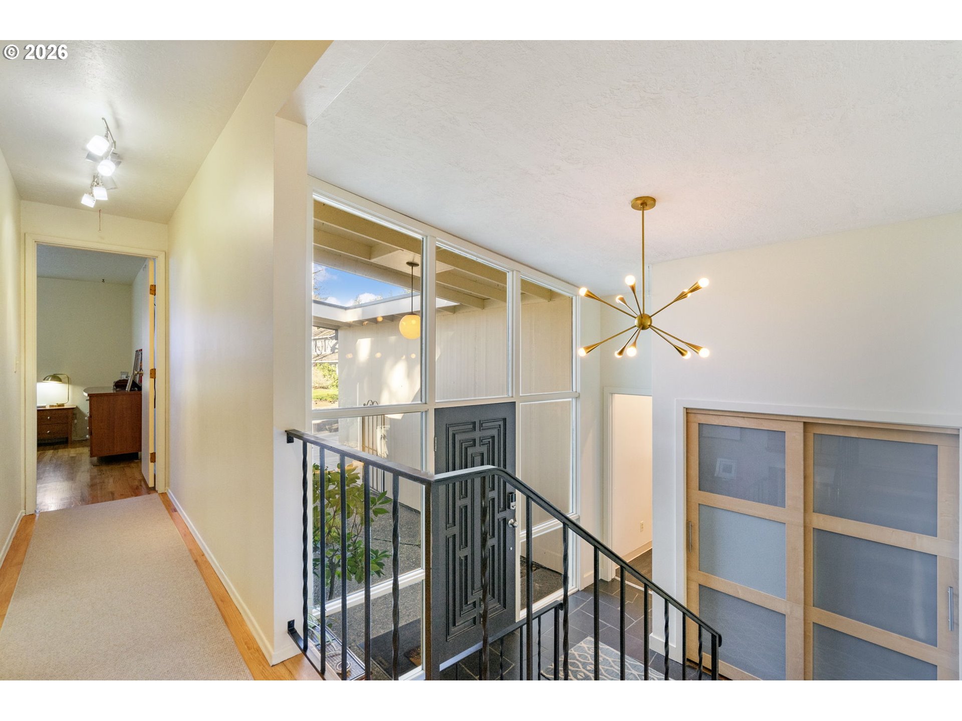 13410 Northwest Overton Street Portland, OR 97229 - Photo 20 of 48 a view of a hallway view with staircase