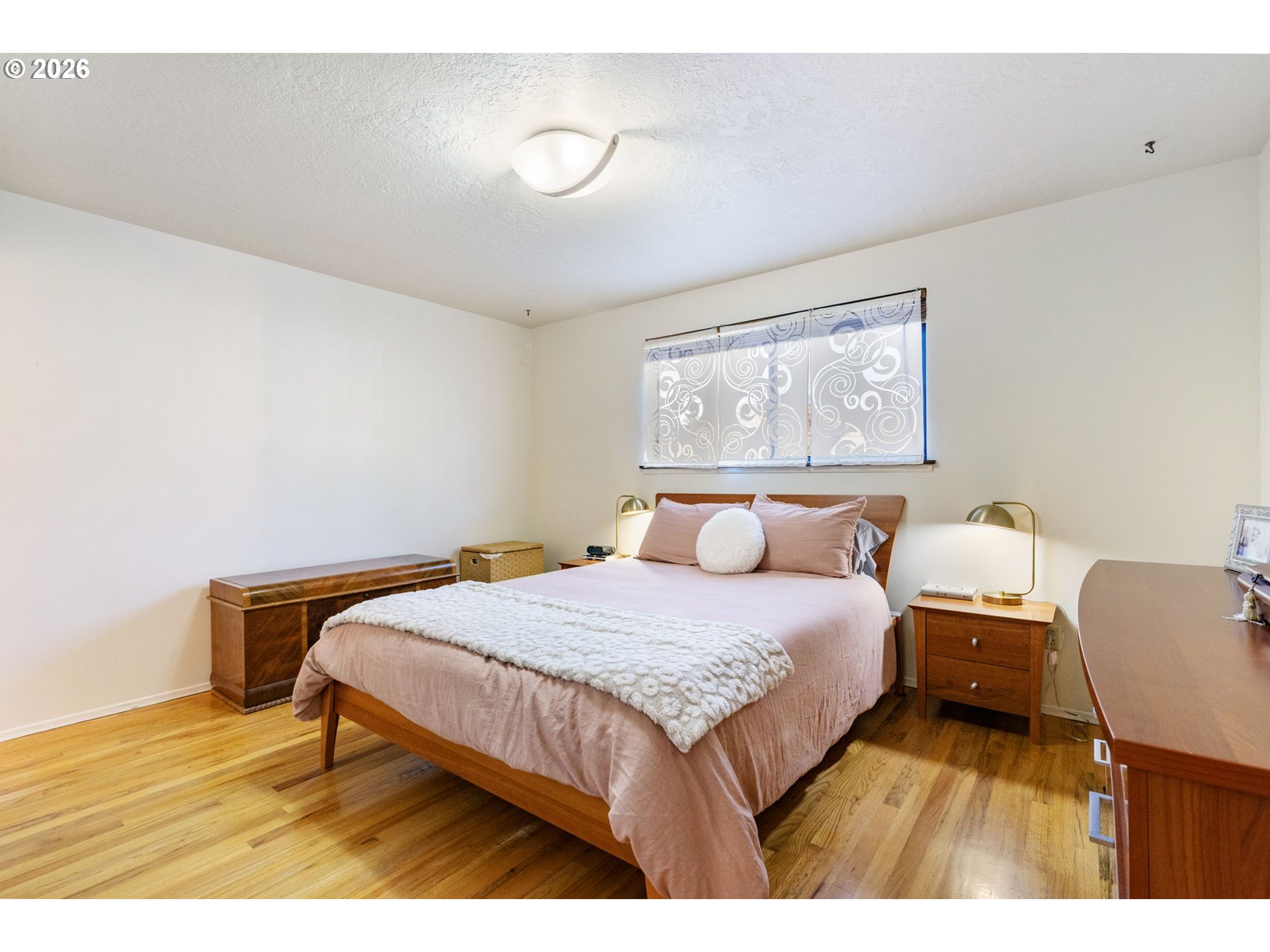 13410 Northwest Overton Street Portland, OR 97229 - Photo 21 of 48 a bedroom with a bed and a desk