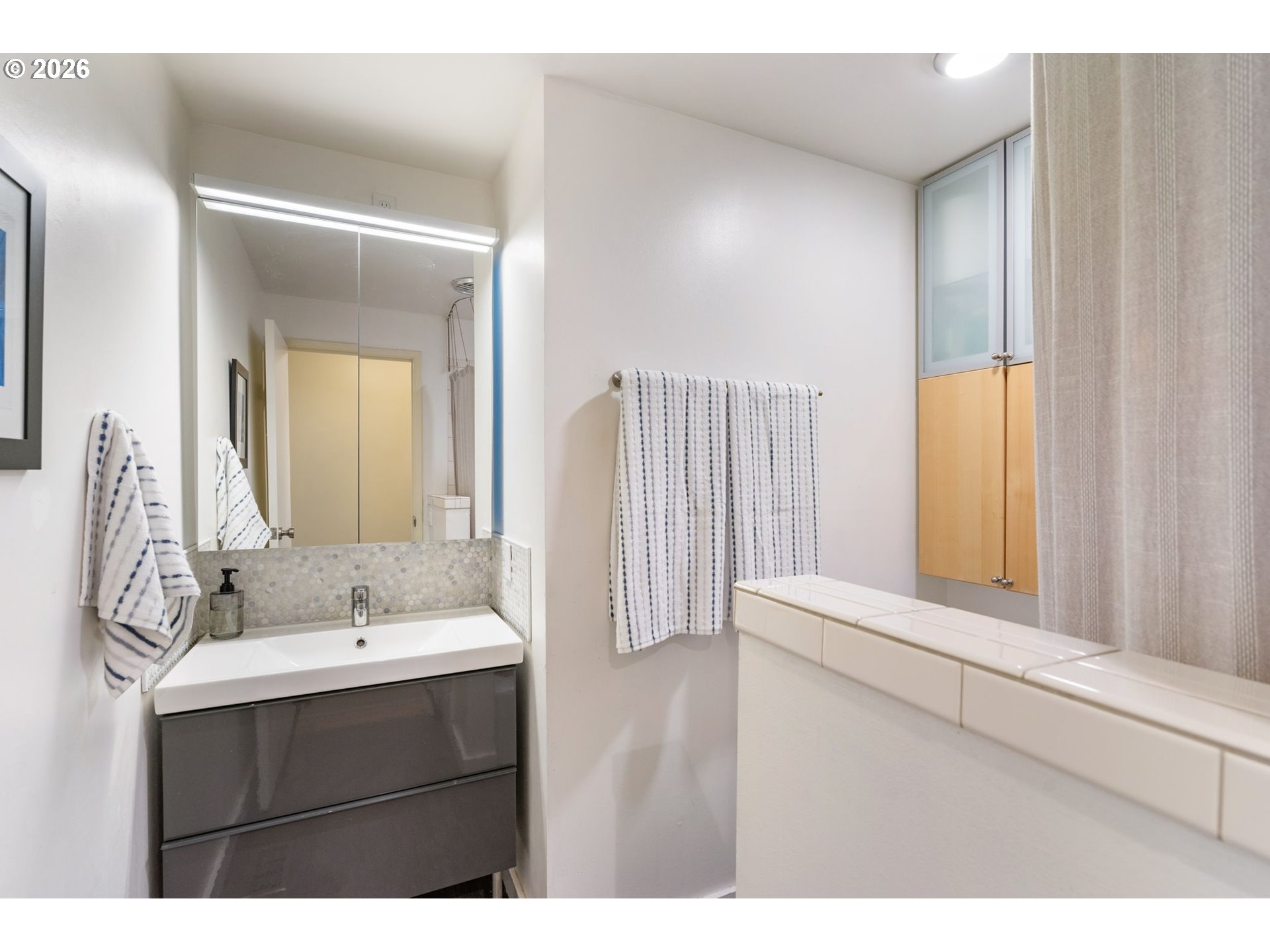 13410 Northwest Overton Street Portland, OR 97229 - Photo 28 of 48 a bathroom with a sink and a mirror