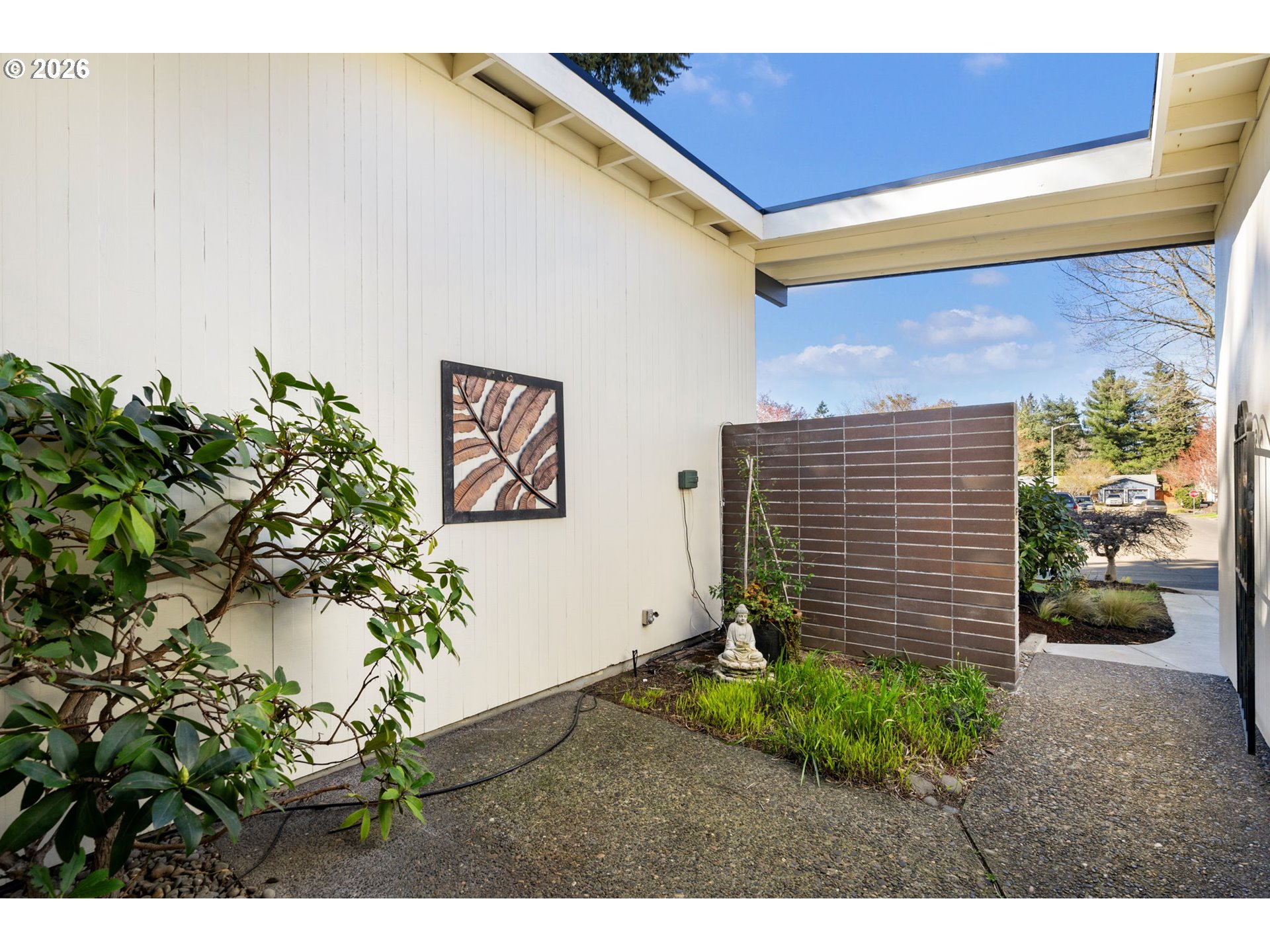 13410 Northwest Overton Street Portland, OR 97229 - Photo 3 of 48 a backyard of a house with lots of green space