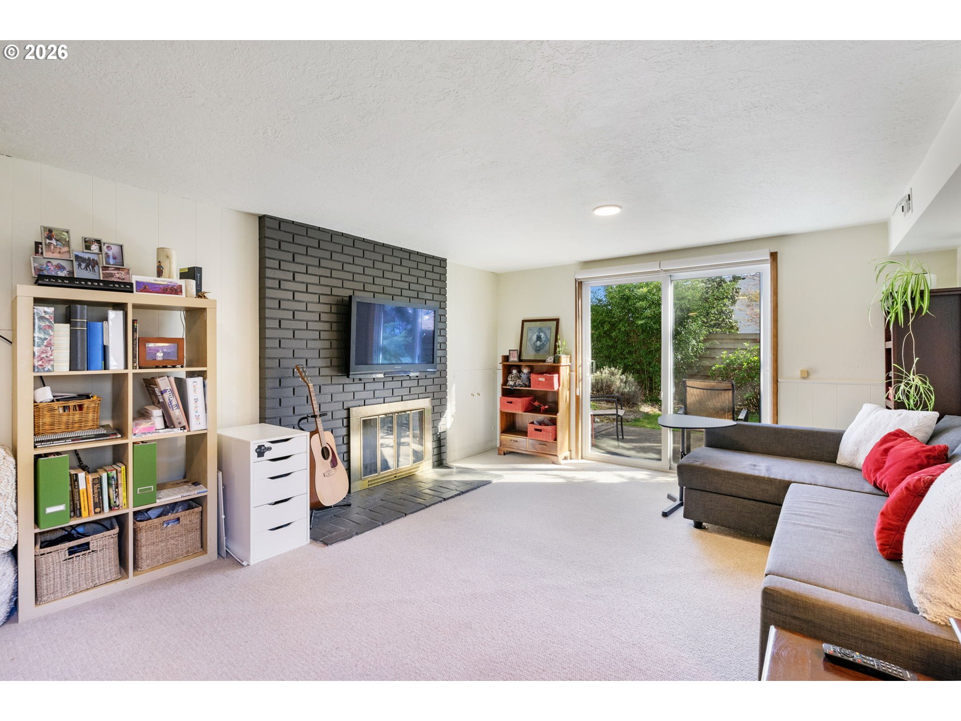 13410 Northwest Overton Street Portland, OR 97229 - Photo 31 of 48 a living room with furniture and a flat screen tv