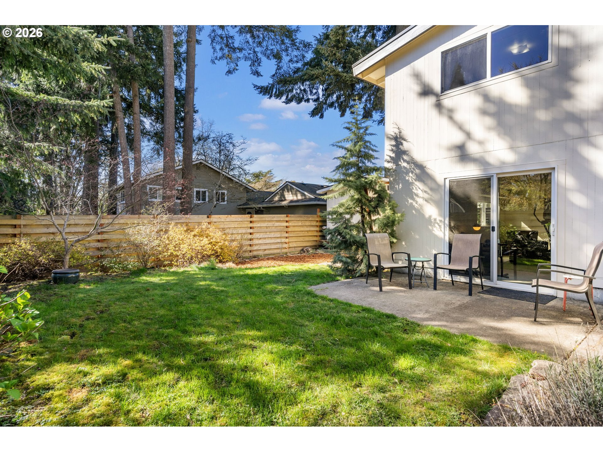 13410 Northwest Overton Street Portland, OR 97229 - Photo 43 of 48 a view of a backyard with sitting area