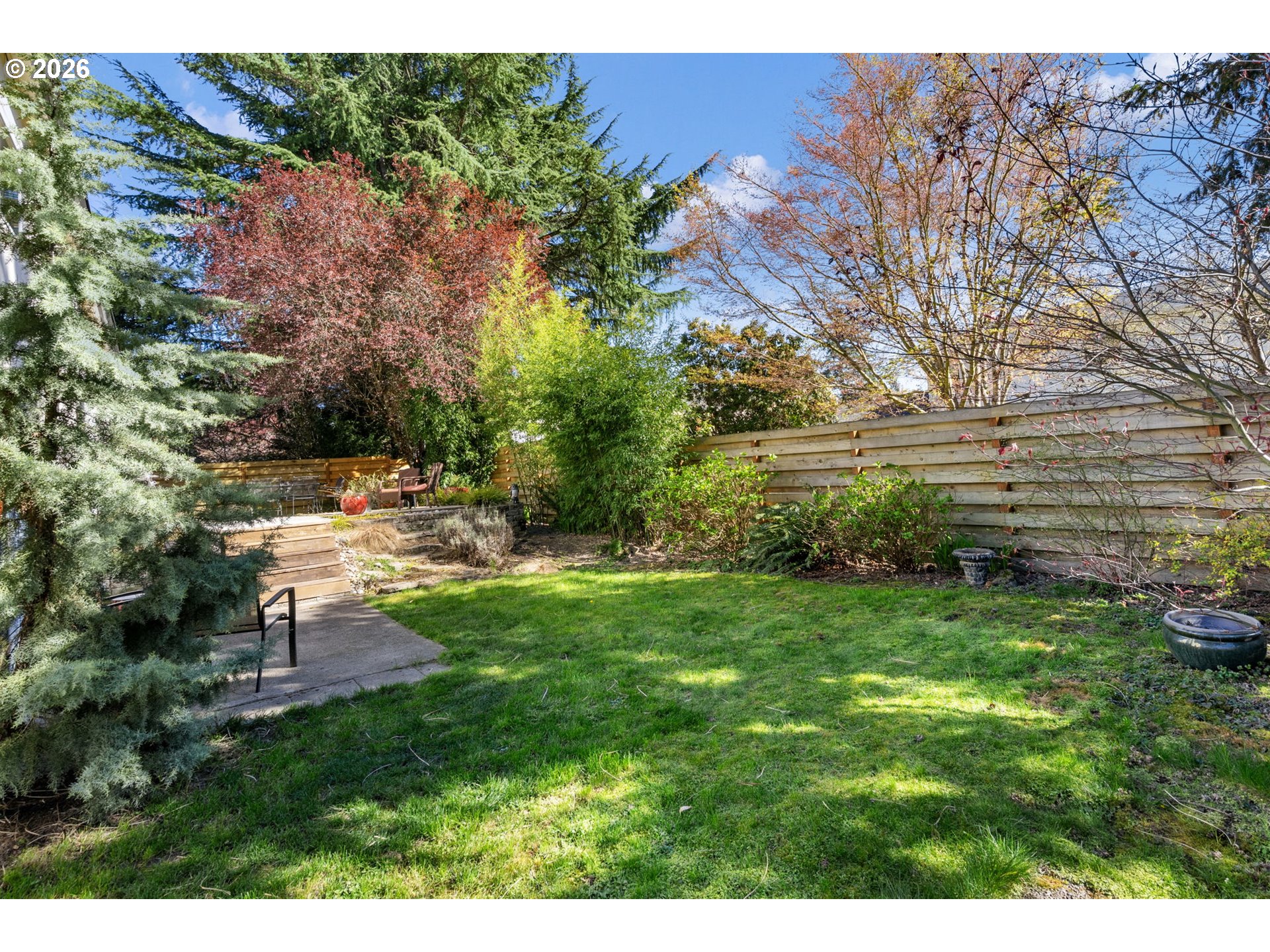 13410 Northwest Overton Street Portland, OR 97229 - Photo 45 of 48 a view of a backyard with large trees
