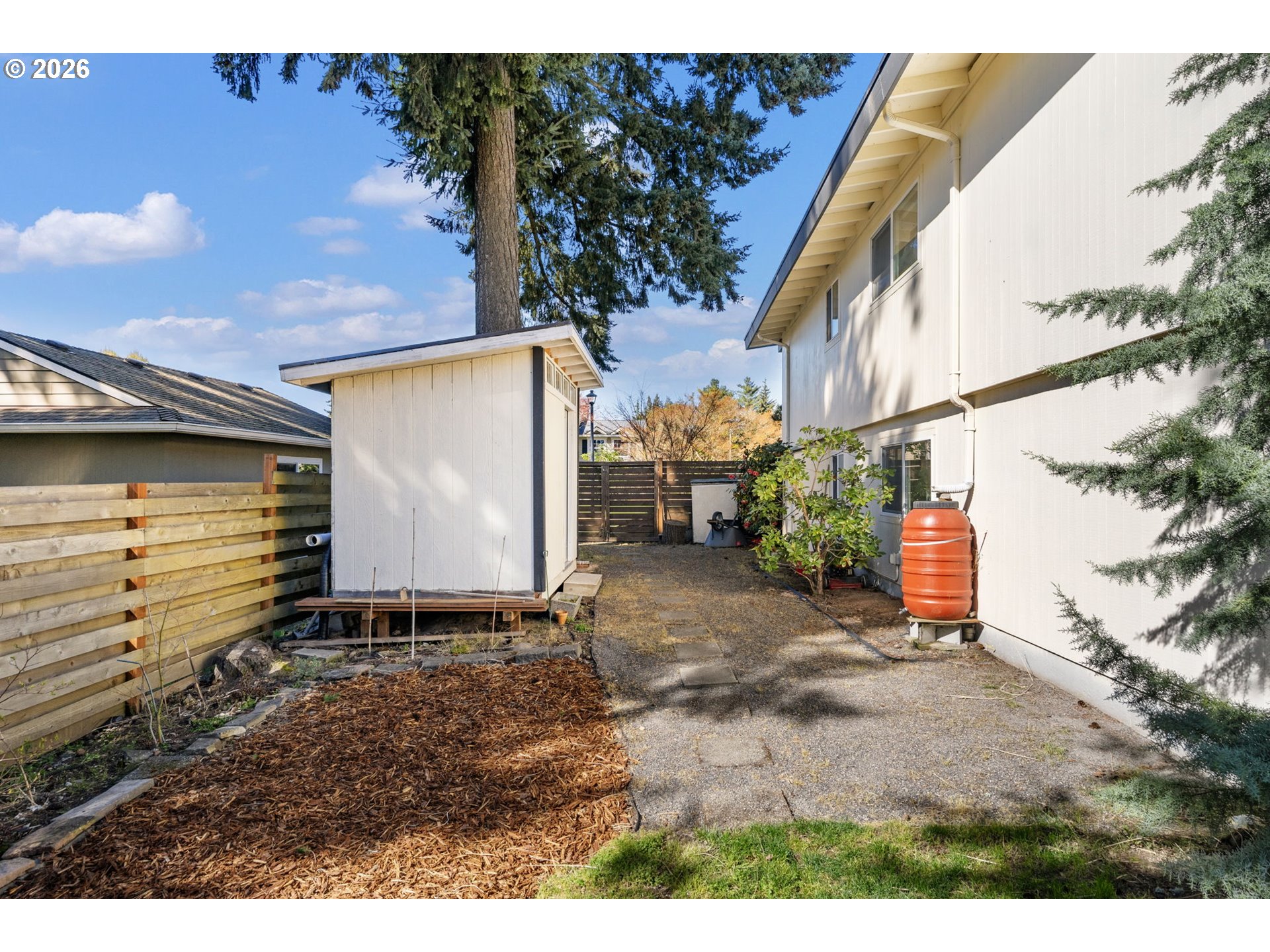 13410 Northwest Overton Street Portland, OR 97229 - Photo 46 of 48 a backyard of a house with lots of green space
