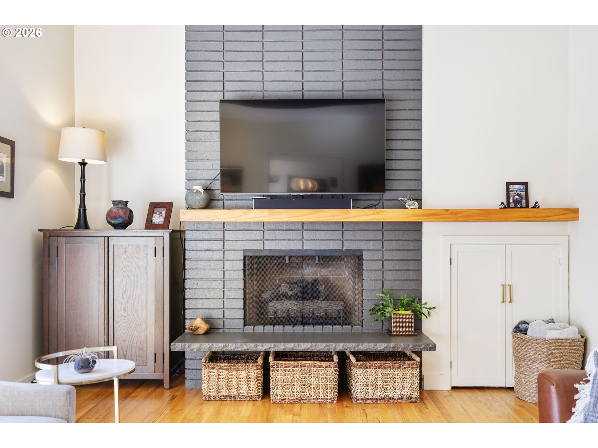 13410 Northwest Overton Street Portland, OR 97229 - Photo 10 of 48 a living room with furniture and a fireplace