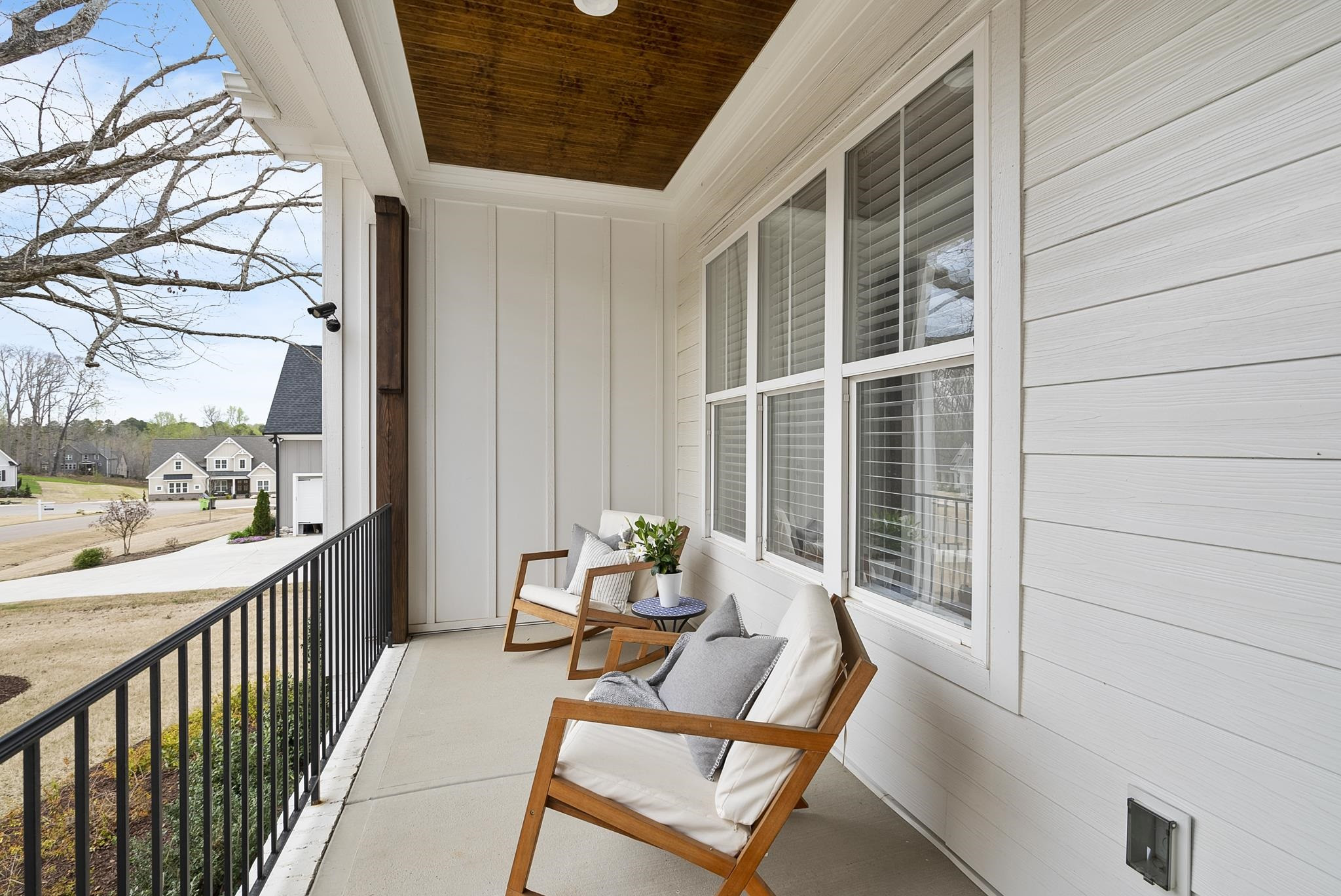 1004 Harrison Ridge Road Wake Forest, NC 27587 - Photo 3 of 48 a view of chair in the balcony