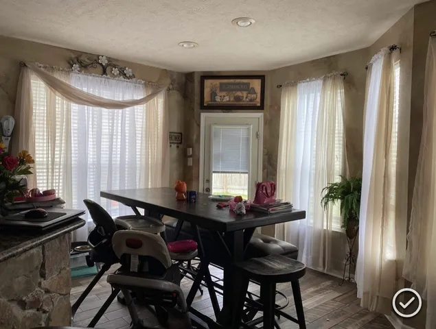 a room with furniture and window