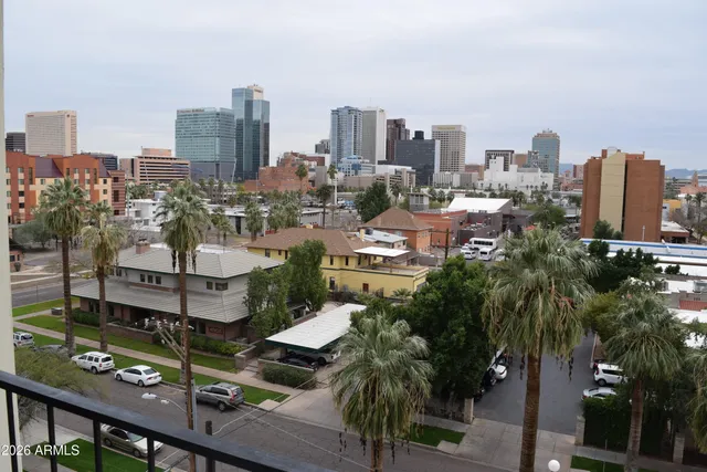 a view of a city with tall buildings