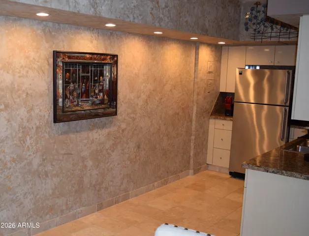 a view of a elevator with refrigerator