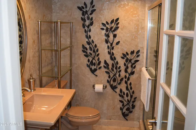 a bathroom with a toilet a sink and a bathtub