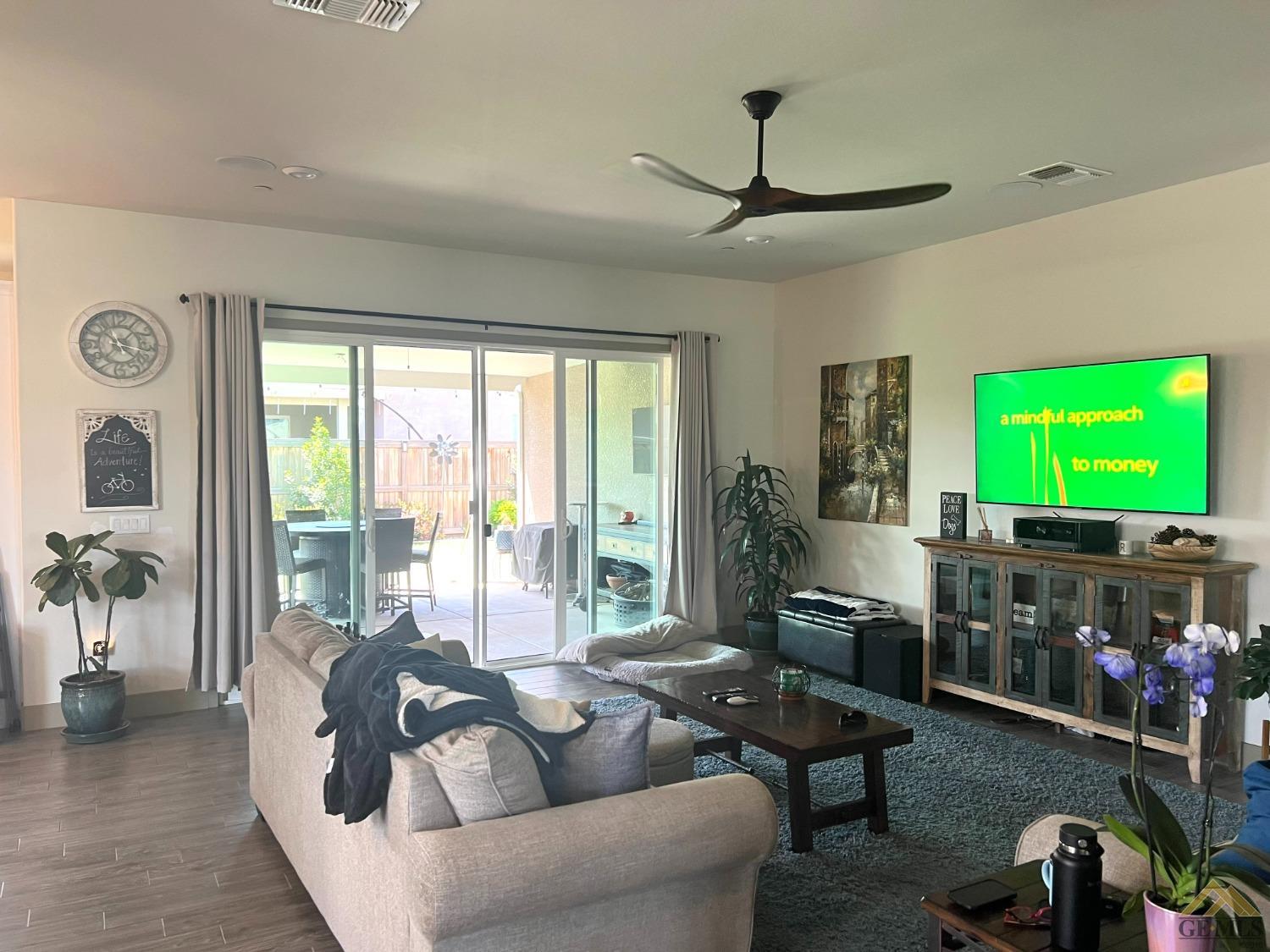 Undisclosed Address Shafter, CA 93263 - Photo 5 of 11 a living room with furniture and a flat screen tv