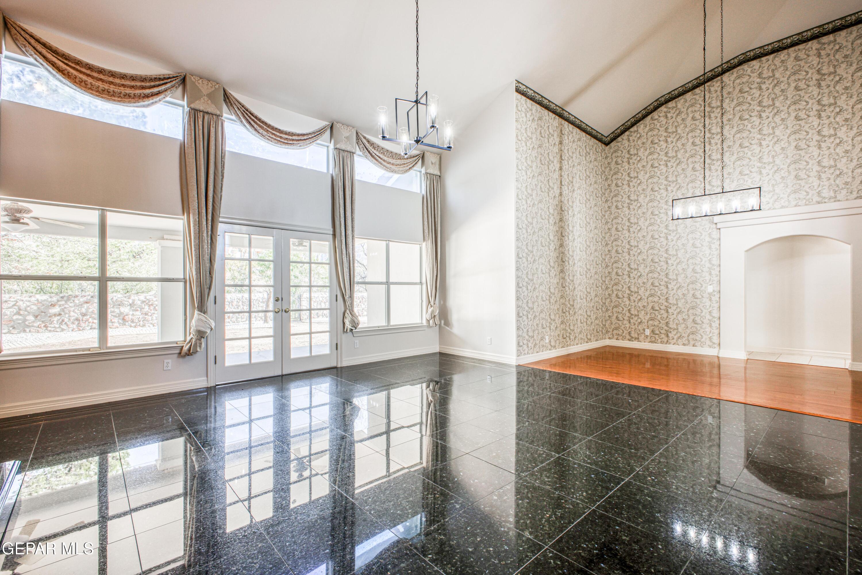 6565 Eagle Ridge Drive El Paso, TX 79912 - Photo 12 of 60 a view of an empty room with a window