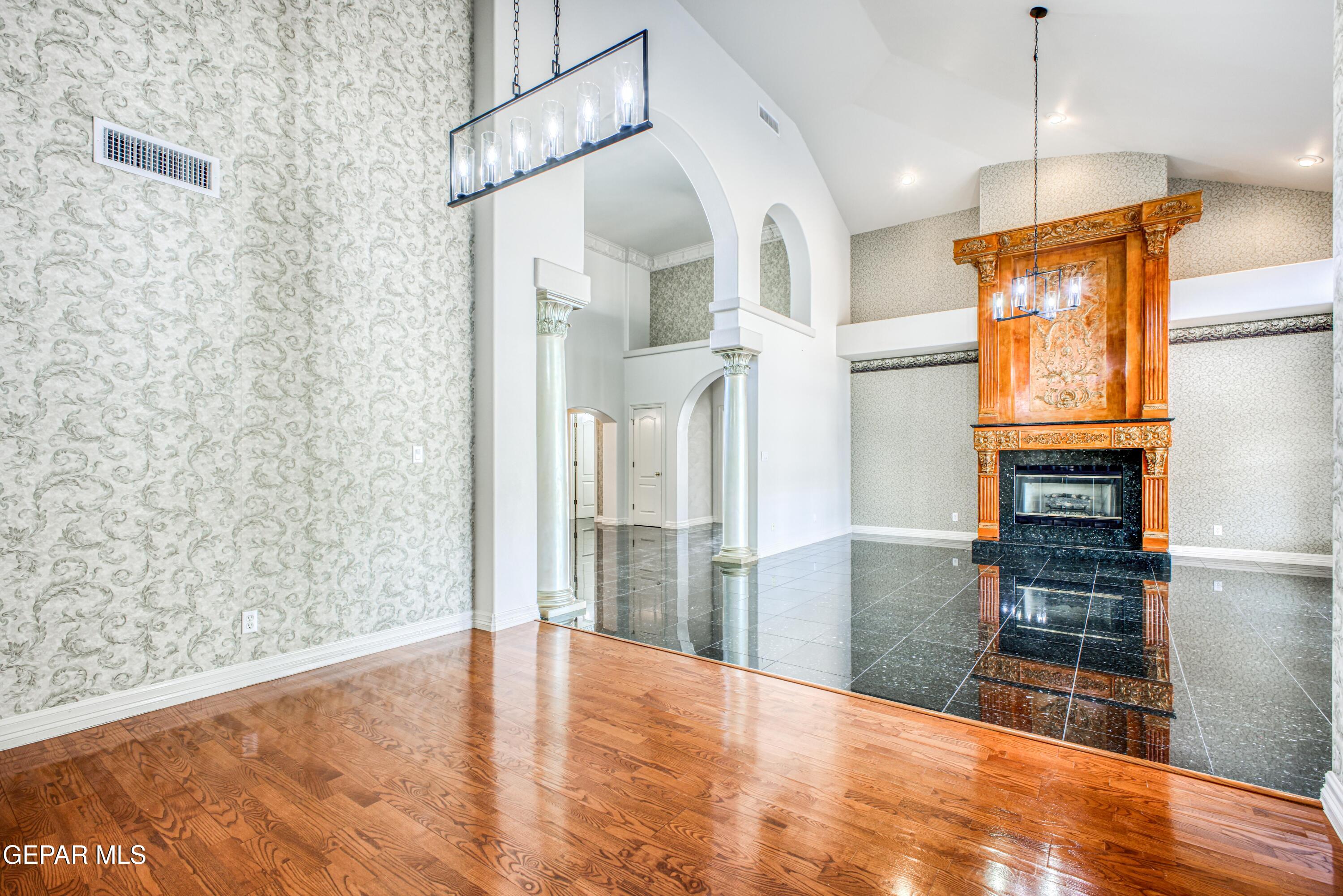 6565 Eagle Ridge Drive El Paso, TX 79912 - Photo 14 of 60 a view of entryway and hall with wooden floor