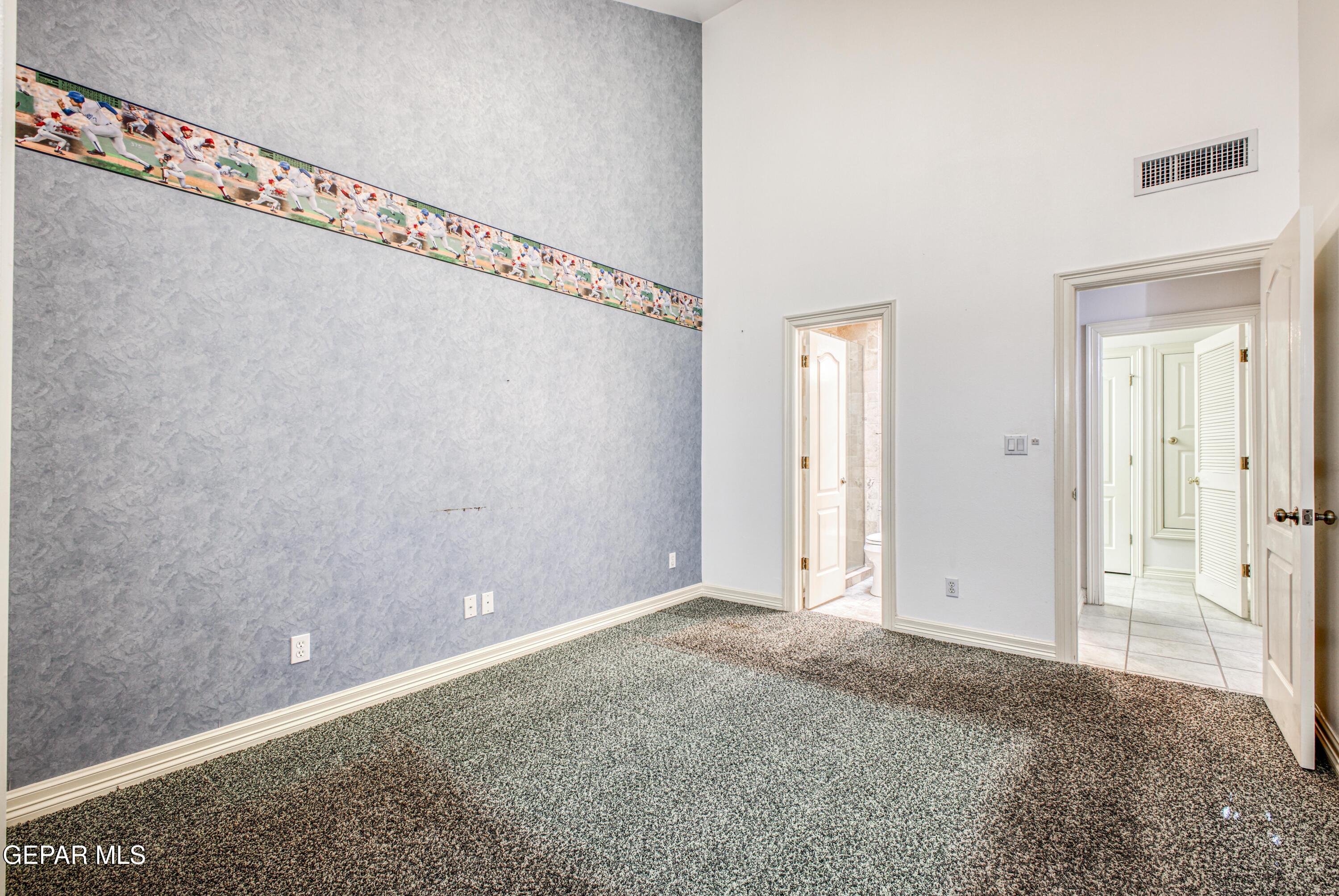 6565 Eagle Ridge Drive El Paso, TX 79912 - Photo 18 of 60 a view of a room with wooden floor