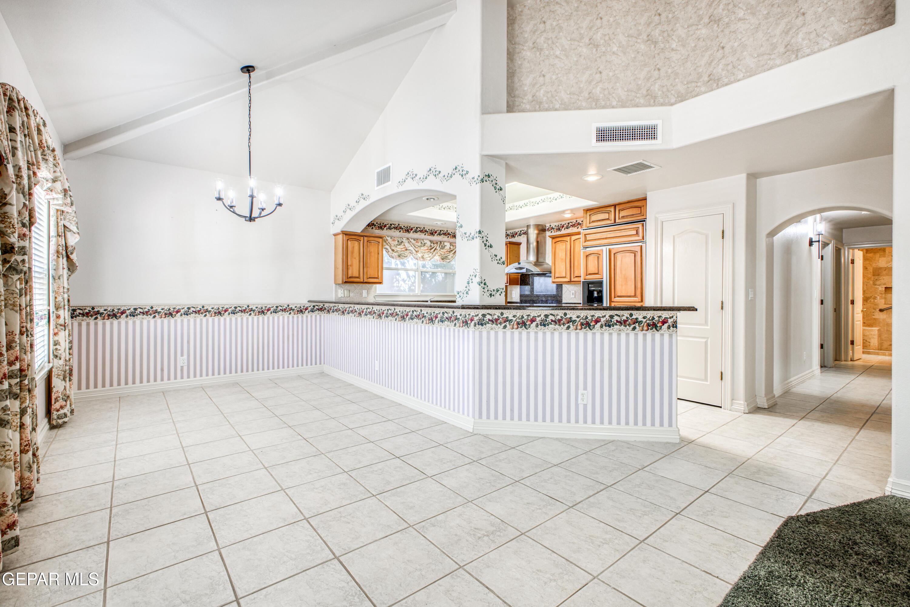 6565 Eagle Ridge Drive El Paso, TX 79912 - Photo 50 of 60 a view of a kitchen with a sink and cabinets