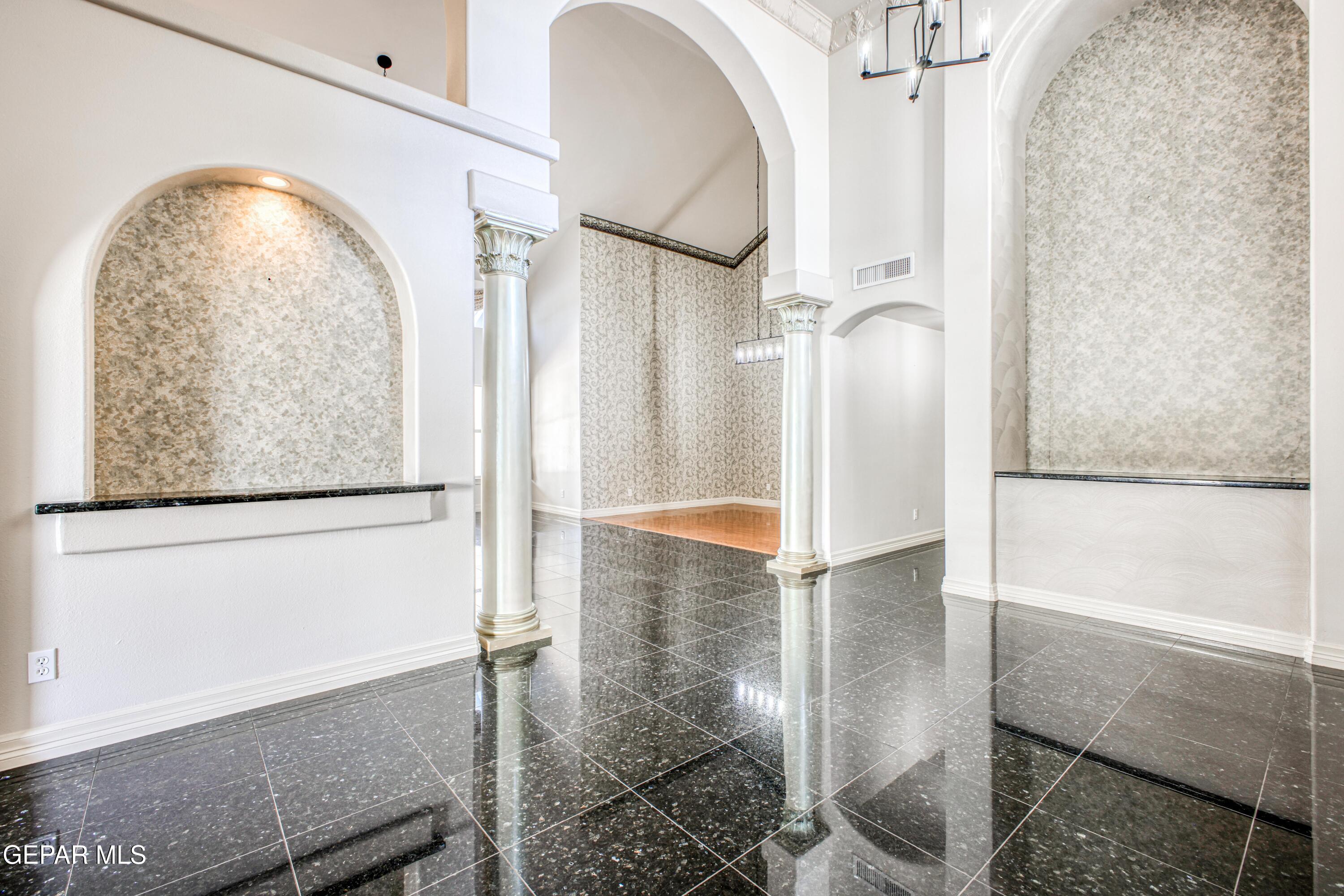 6565 Eagle Ridge Drive El Paso, TX 79912 - Photo 8 of 60 view of hall with wooden floor