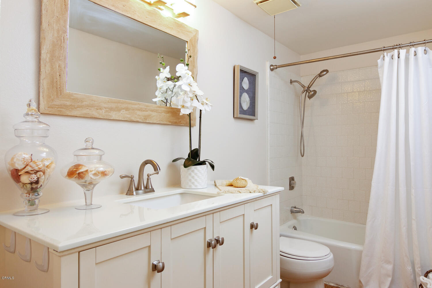 5120 West Wooley Road, Unit 2 Oxnard, CA 93035 - Photo 20 of 35 a bathroom with a sink a toilet and shower