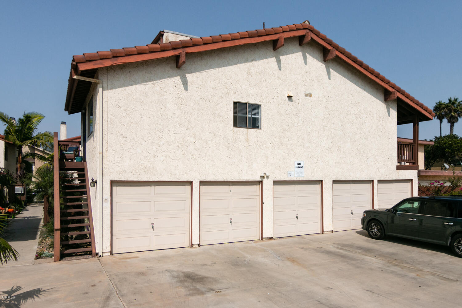 5120 West Wooley Road, Unit 2 Oxnard, CA 93035 - Photo 31 of 35 a view of a house with a garage
