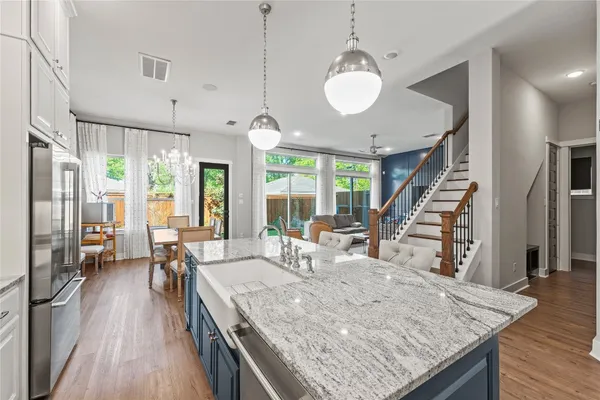 a view of a kitchen and dining room
