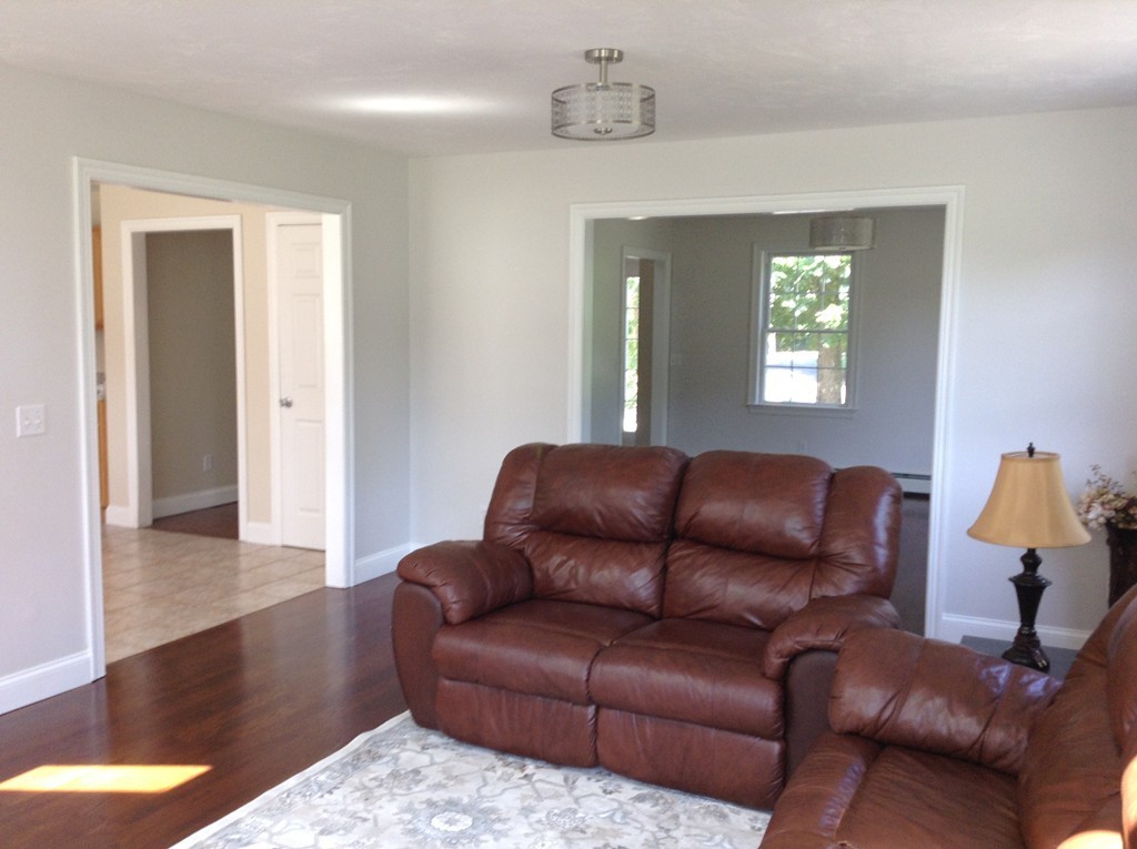 91 Haggerty Road Charlton, MA 01507 - Photo 8 of 15 a living room with furniture and a window