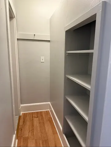 a view of an empty walk in closet