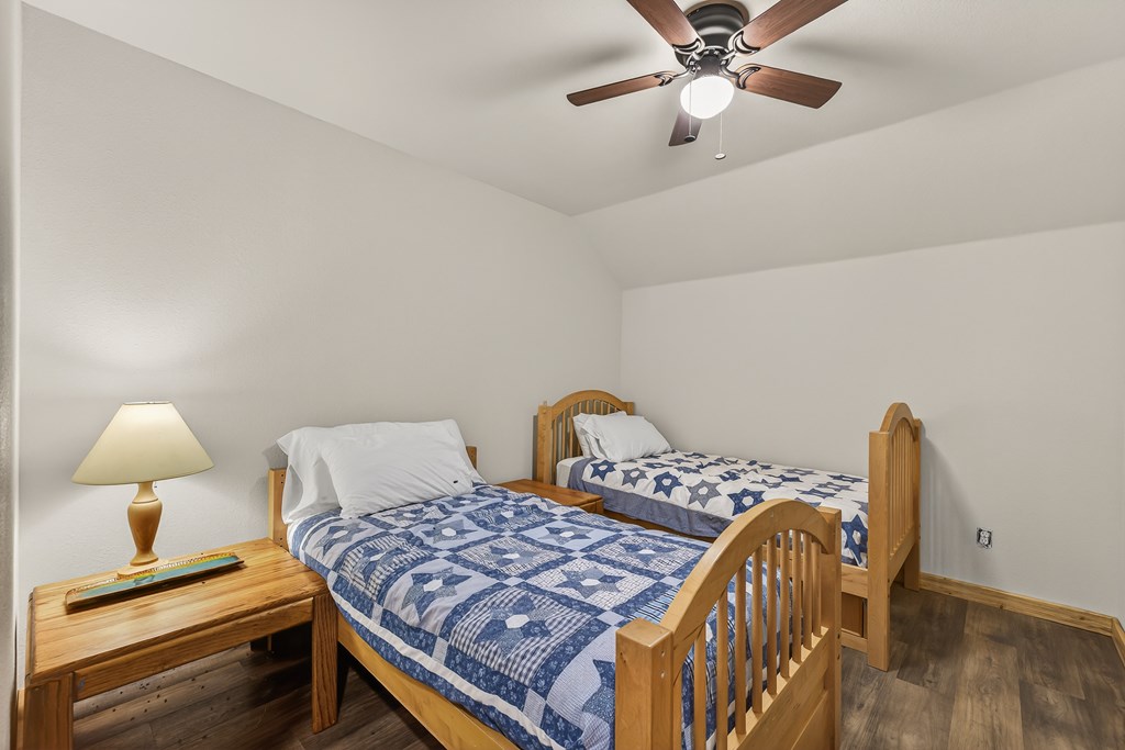 1510 South Samson Trail McCall, ID 83638 - Photo 16 of 50 Second bedroom and hallway to garage