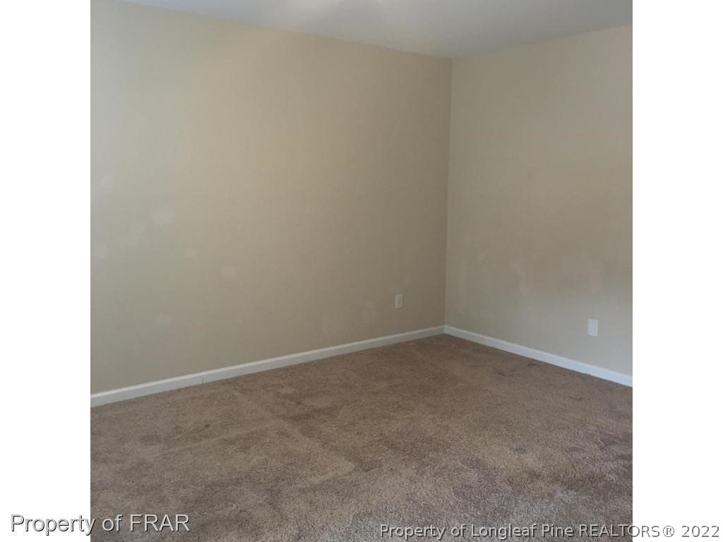 434 New Castle Lane Spring Lake, NC 28390 - Photo 4 of 12 a view of an empty room