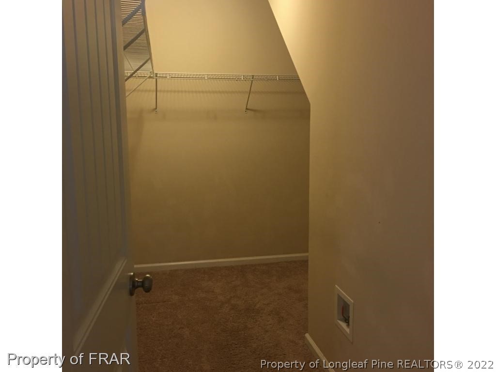 434 New Castle Lane Spring Lake, NC 28390 - Photo 8 of 12 a bathroom with a shower