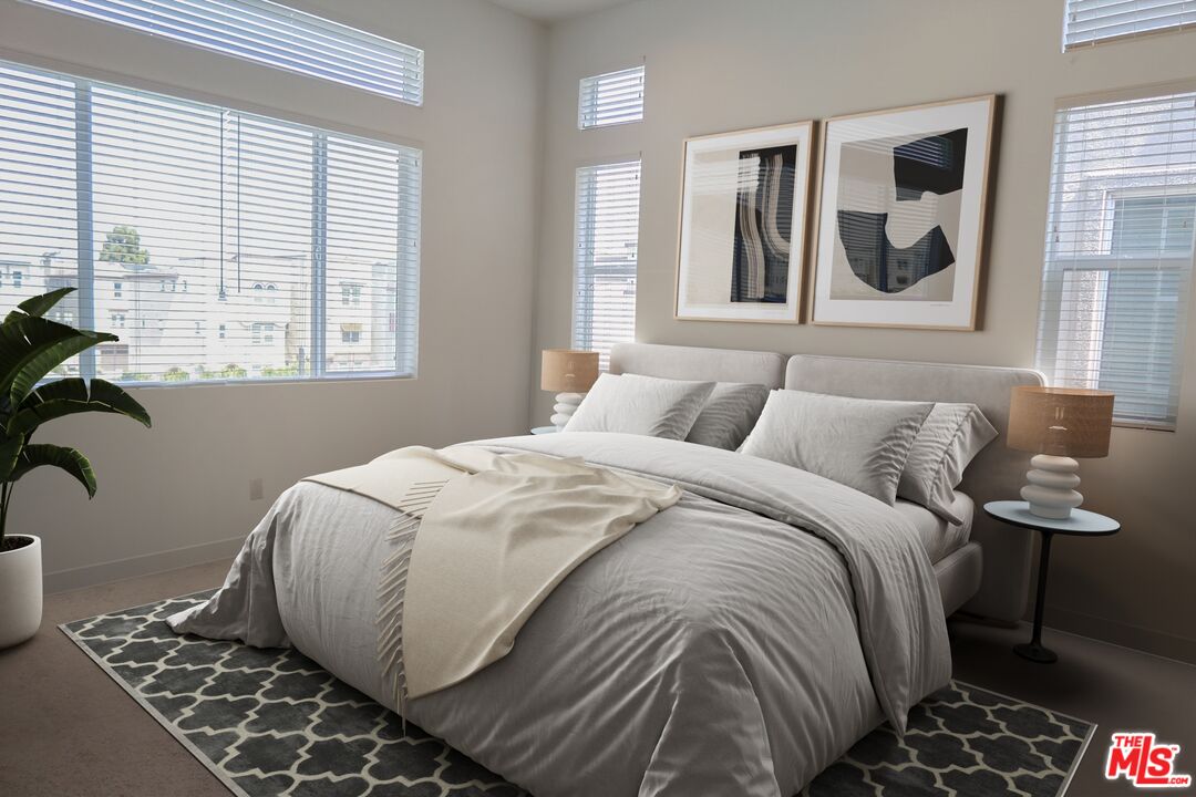 625 Daniel Freeman Circle Inglewood, CA 90301 - Photo 17 of 23 a bedroom with a bed and a window