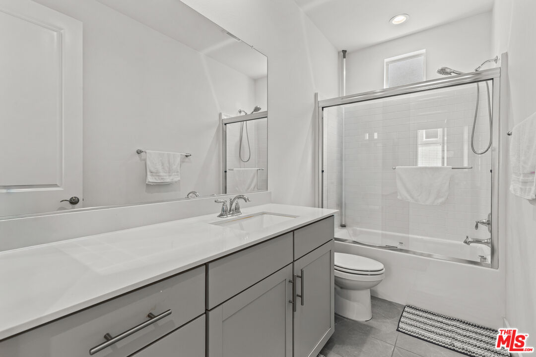 625 Daniel Freeman Circle Inglewood, CA 90301 - Photo 18 of 23 a bathroom with a sink a toilet and shower