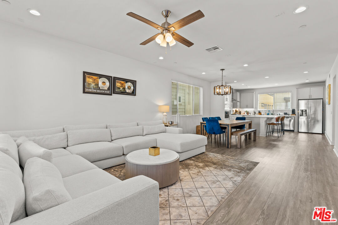 625 Daniel Freeman Circle Inglewood, CA 90301 - Photo 7 of 23 a living room with furniture and kitchen view