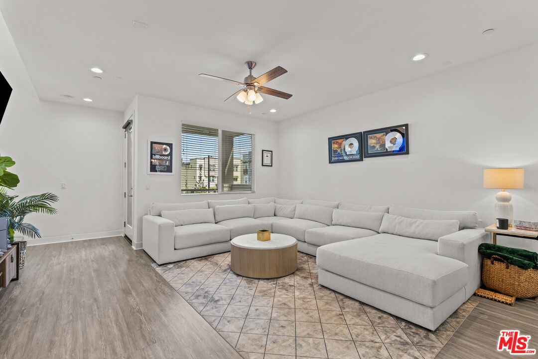 625 Daniel Freeman Circle Inglewood, CA 90301 - Photo 8 of 23 a living room with furniture and a wooden floor