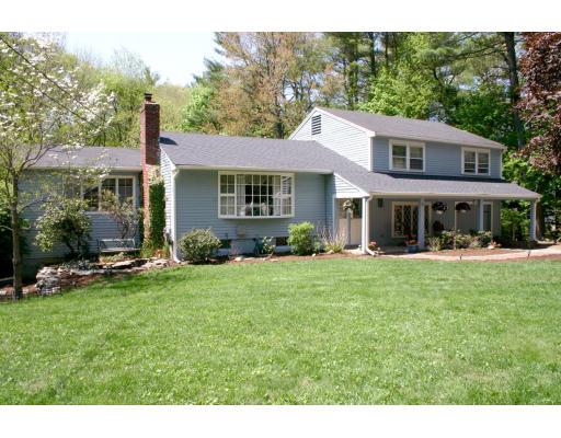 18 White Road Wayland, MA 01778 - Photo 1 of 19 a backyard of a house with table and chairs