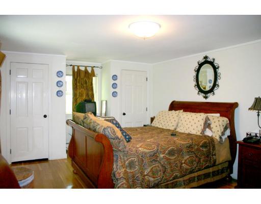 18 White Road Wayland, MA 01778 - Photo 13 of 19 a bedroom with a bed and a window