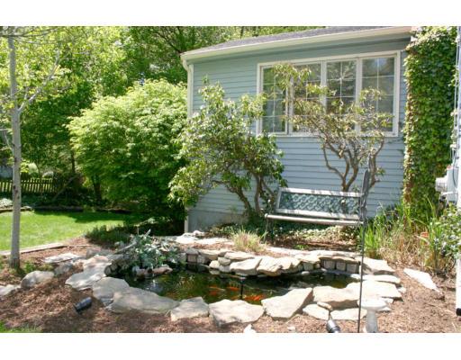 18 White Road Wayland, MA 01778 - Photo 17 of 19 a view of a backyard with sitting area