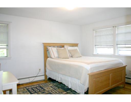 18 White Road Wayland, MA 01778 - Photo 18 of 19 a bedroom with a bed and a window