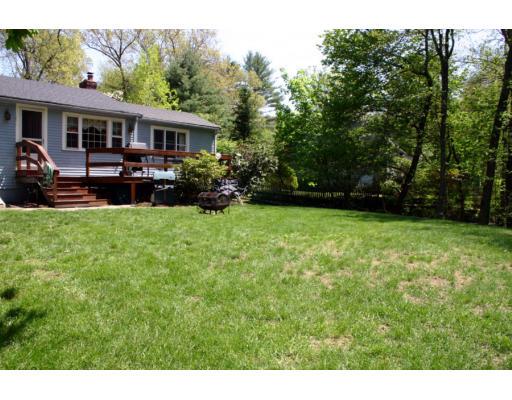 18 White Road Wayland, MA 01778 - Photo 19 of 19 a view of a house with a backyard porch and sitting area