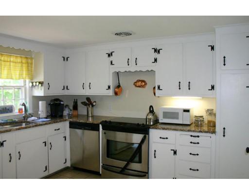 18 White Road Wayland, MA 01778 - Photo 6 of 19 a kitchen with granite countertop a sink cabinets and stainless steel appliances
