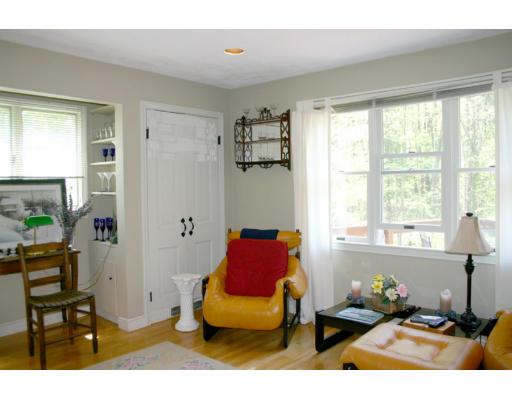 18 White Road Wayland, MA 01778 - Photo 7 of 19 a bedroom with a bed and wooden floor