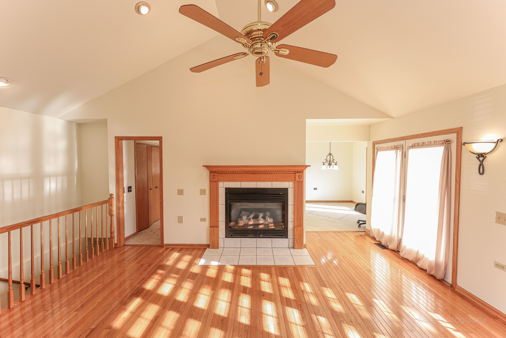 206 1/2 Redbud Drive Joliet, IL 60433 - Photo 9 of 34 a view of a livingroom with a fireplace and window