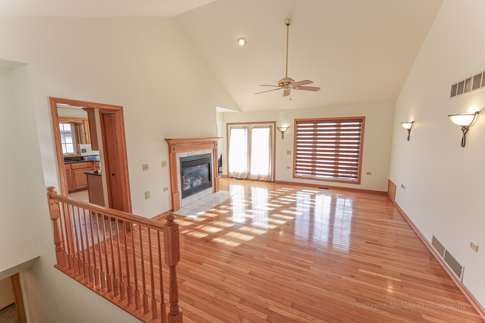 206 1/2 Redbud Drive Joliet, IL 60433 - Photo 10 of 34 a view of a room with wooden floor fireplace and windows