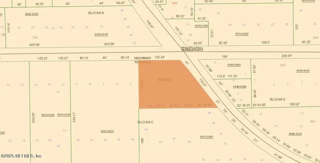 a street sign is next to a tall building