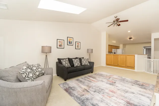 a living room with furniture and a couch