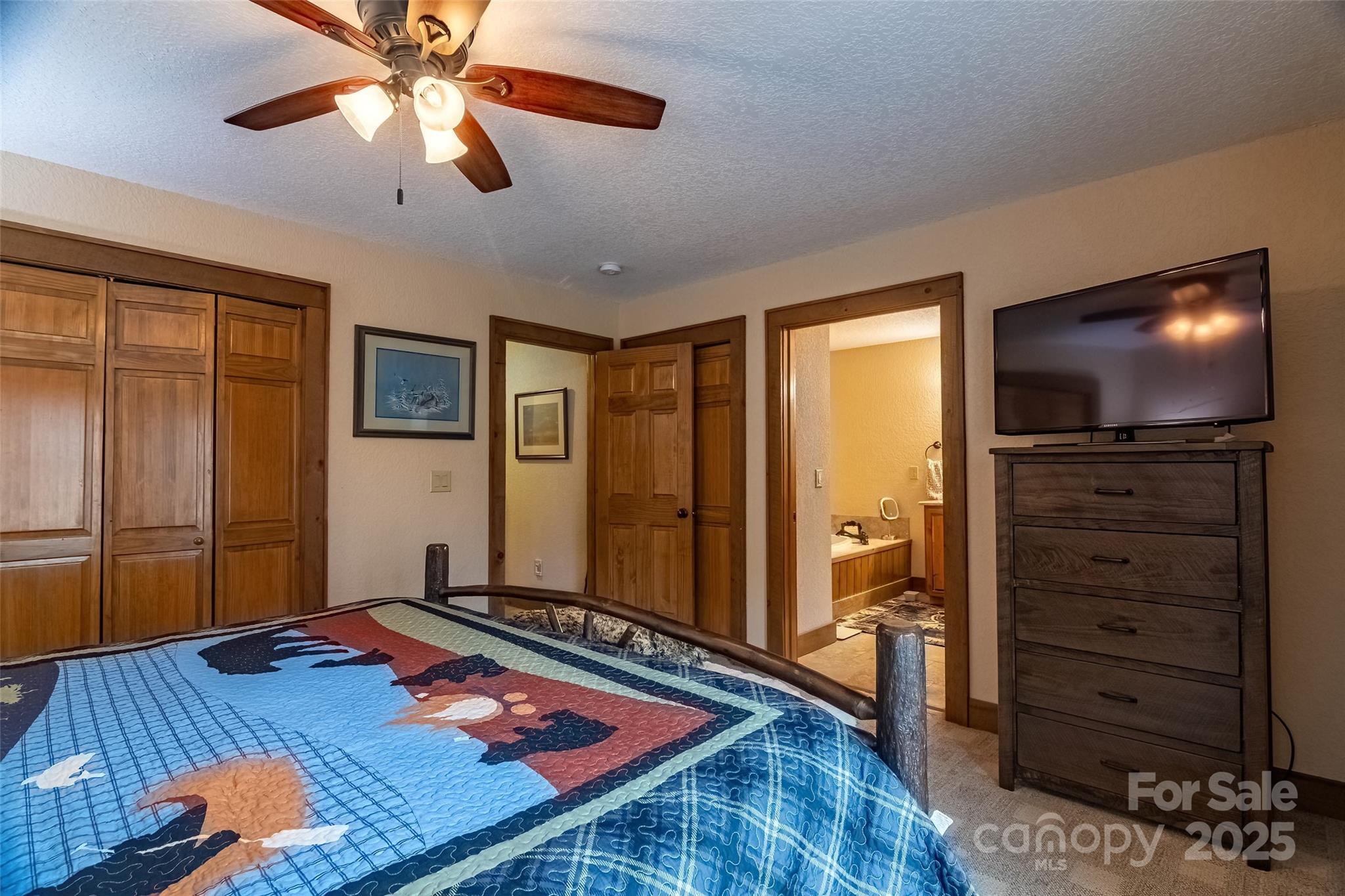 620 Sapphire Valley Road Sapphire, NC 28774 - Photo 20 of 48 a living room with furniture and flat screen tv